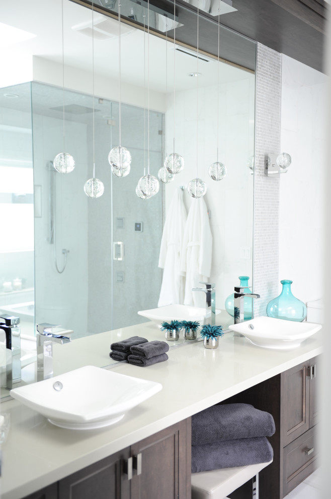 This is an example of a transitional bathroom in Vancouver with a vessel sink.