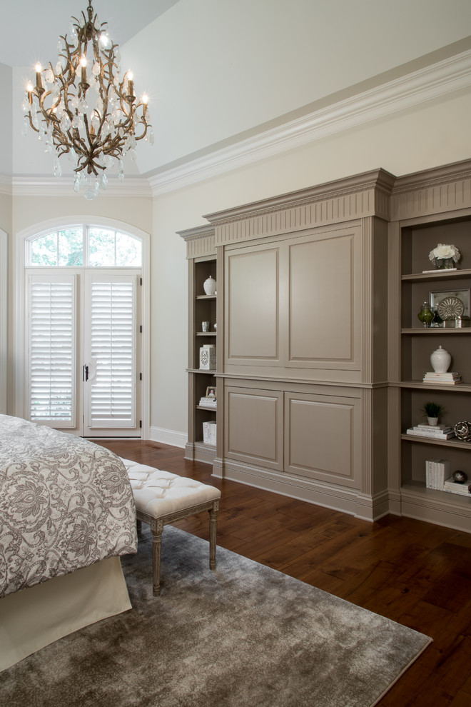 Photo of a traditional master bedroom in Other with beige walls.