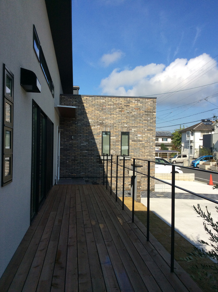 他の地域にあるインダストリアルスタイルのおしゃれなウッドデッキの写真