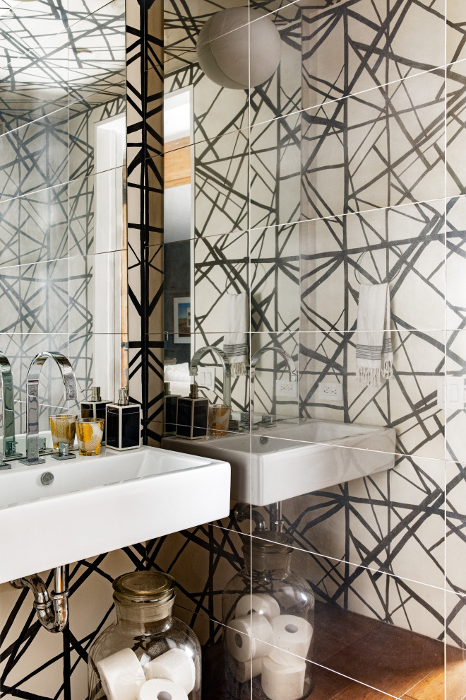 Photo of a small eclectic shower room bathroom in New York with white cabinets, grey tiles, ceramic tiles, a wall-mounted sink, white worktops, a single sink, a floating vanity unit and wallpapered walls.