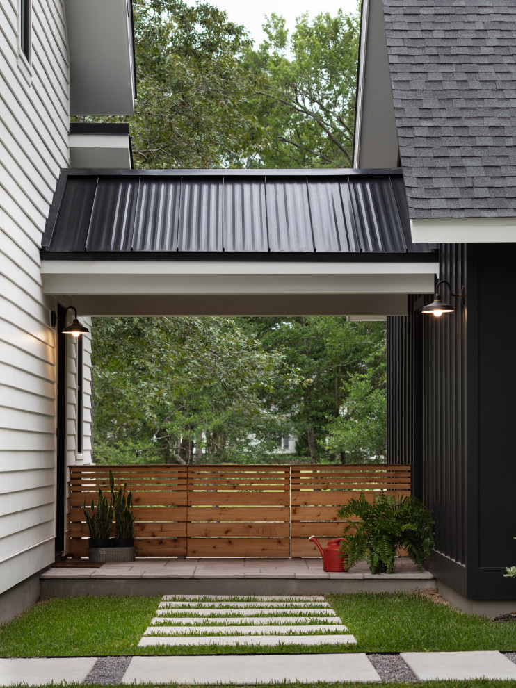 Woodland - Breezeway from garage to back door of modern luxury farmhouse in Pass Christian Mississippi photographed for Watters Architecture by Birmingham Alabama based architectural and interiors photographer Tommy Daspit.