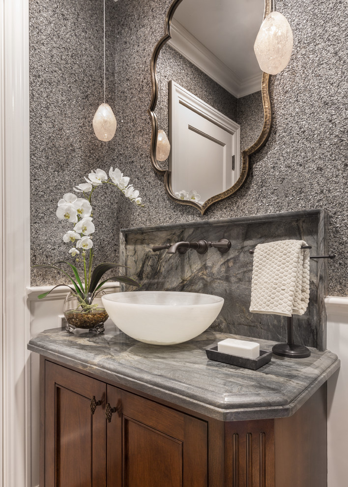 Design ideas for a small transitional powder room in San Francisco with recessed-panel cabinets, dark wood cabinets, grey walls, a vessel sink, engineered quartz benchtops and grey benchtops.
