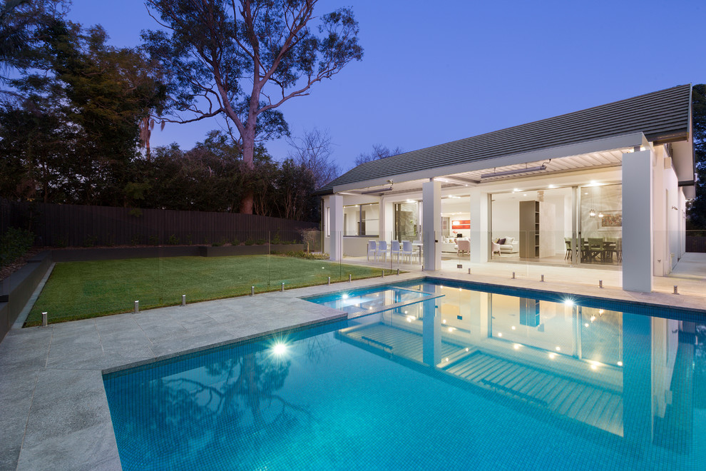 Inspiration for a modern backyard custom-shaped lap pool in Sydney.