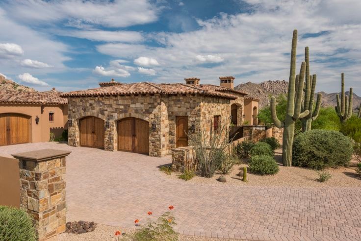 Inspiration for an expansive traditional attached garage in Phoenix.
