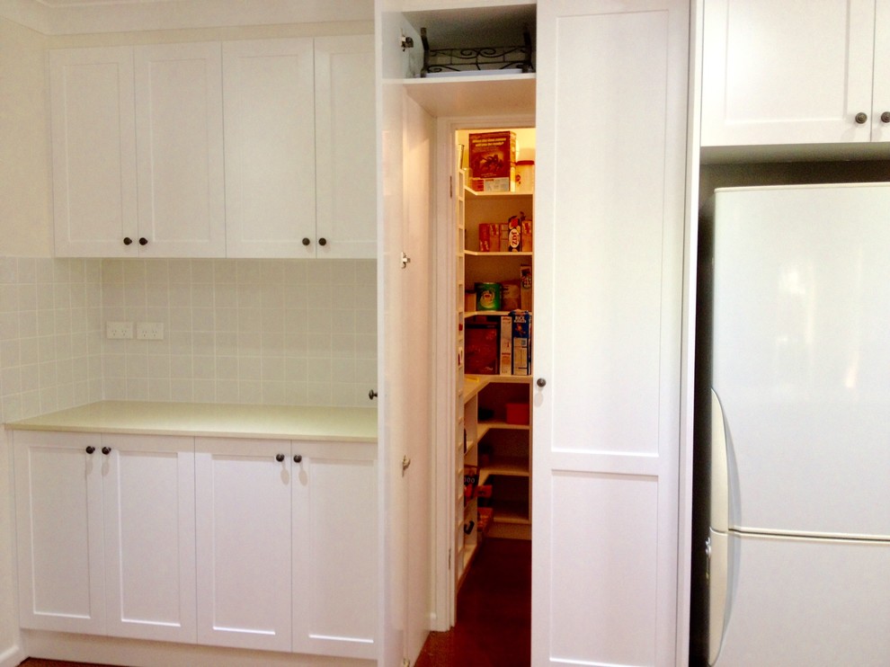 Design ideas for a transitional kitchen in Sydney.