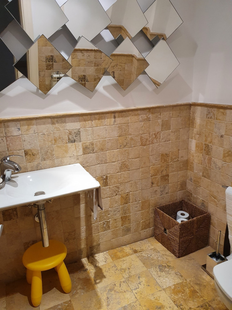 Photo of a mid-sized contemporary kids bathroom in London with a one-piece toilet, beige tile, travertine, beige walls, limestone floors, an undermount sink, beige floor, white benchtops, a single vanity, a freestanding vanity and coffered.