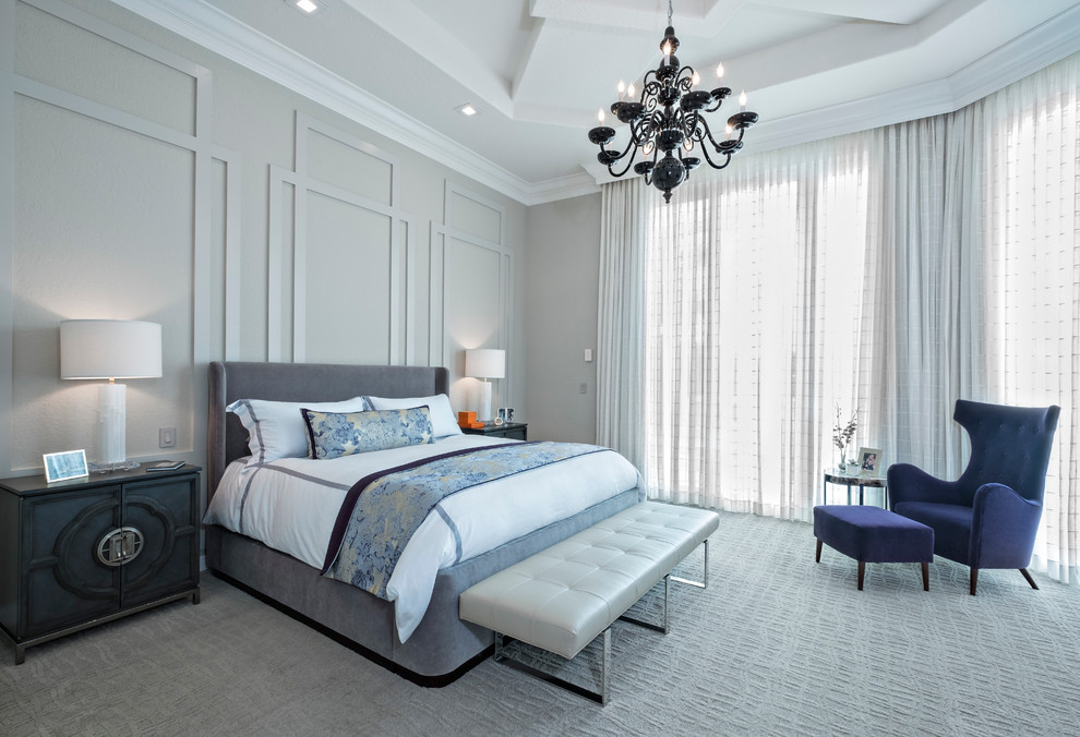 Photo of a large contemporary master bedroom in New York with grey walls, carpet and no fireplace.