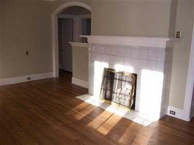 This ugly white tile fireplace needs to go looking for suggestions on what type of brick/stone we should use in replacing it. Also