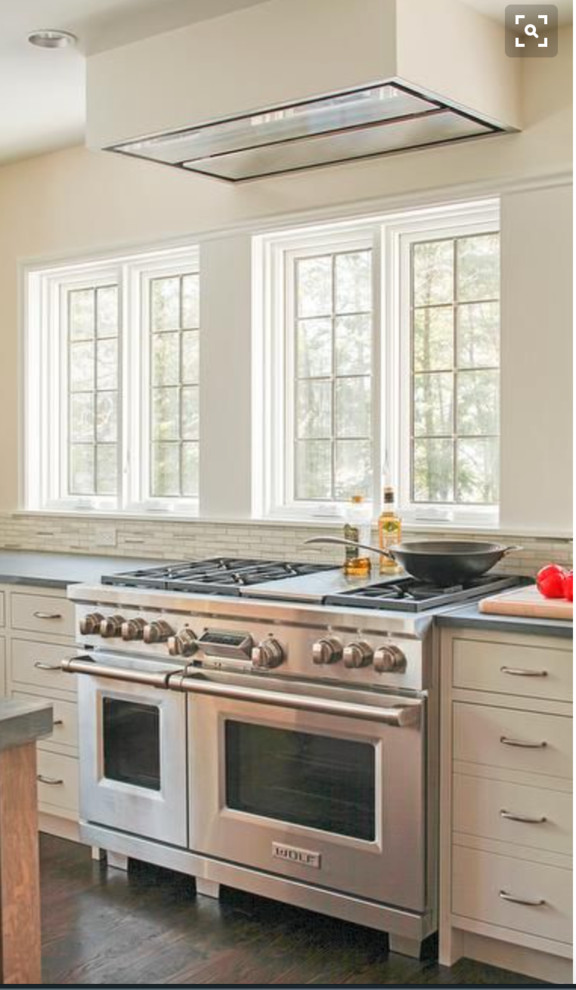 Range hood over window discount