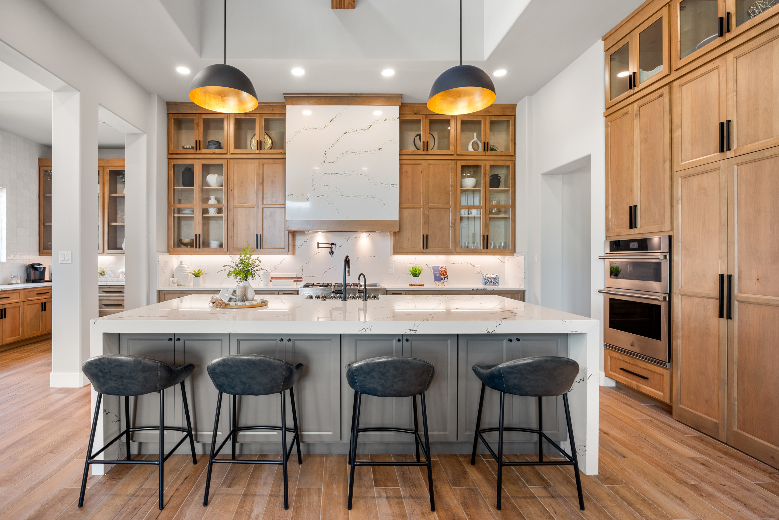 Warm lighting design creating cozy modern kitchen aesthetic