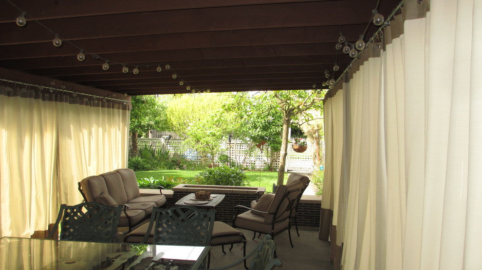 Patio - craftsman backyard concrete patio idea in Seattle