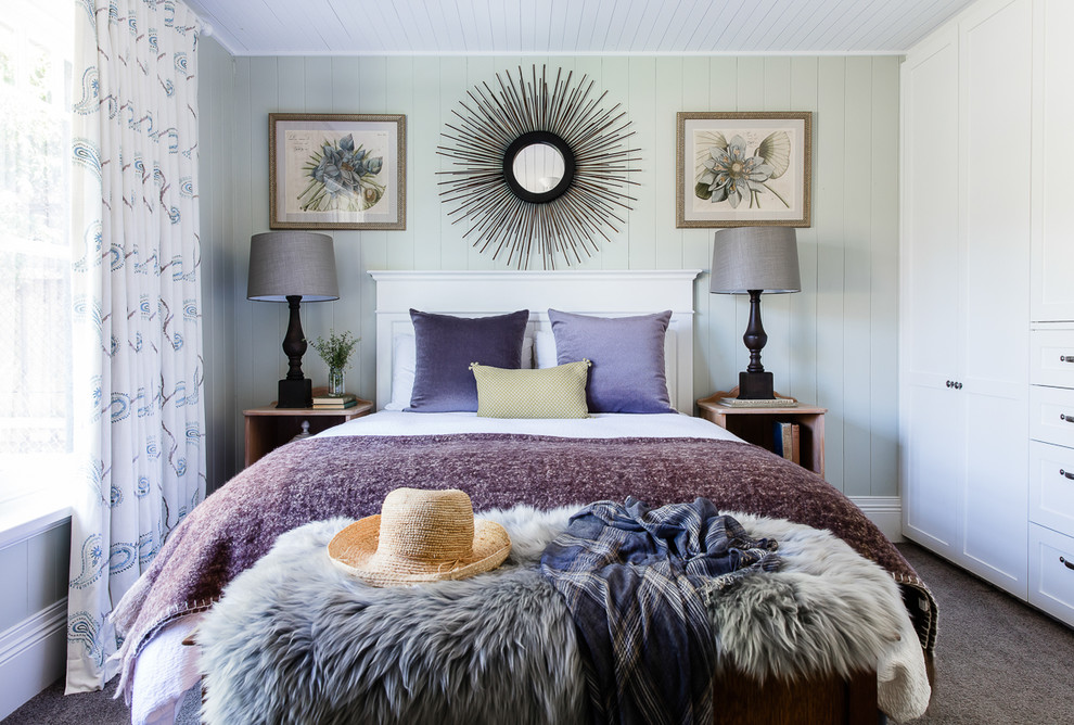 Design ideas for a large transitional guest bedroom in Sydney with green walls and carpet.