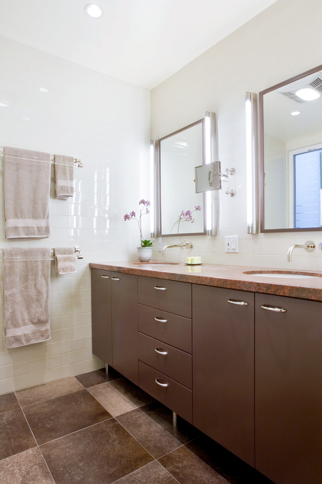 Photo of a mid-sized contemporary master bathroom in San Francisco with an undermount sink, flat-panel cabinets, granite benchtops, porcelain tile, porcelain floors and brown cabinets.