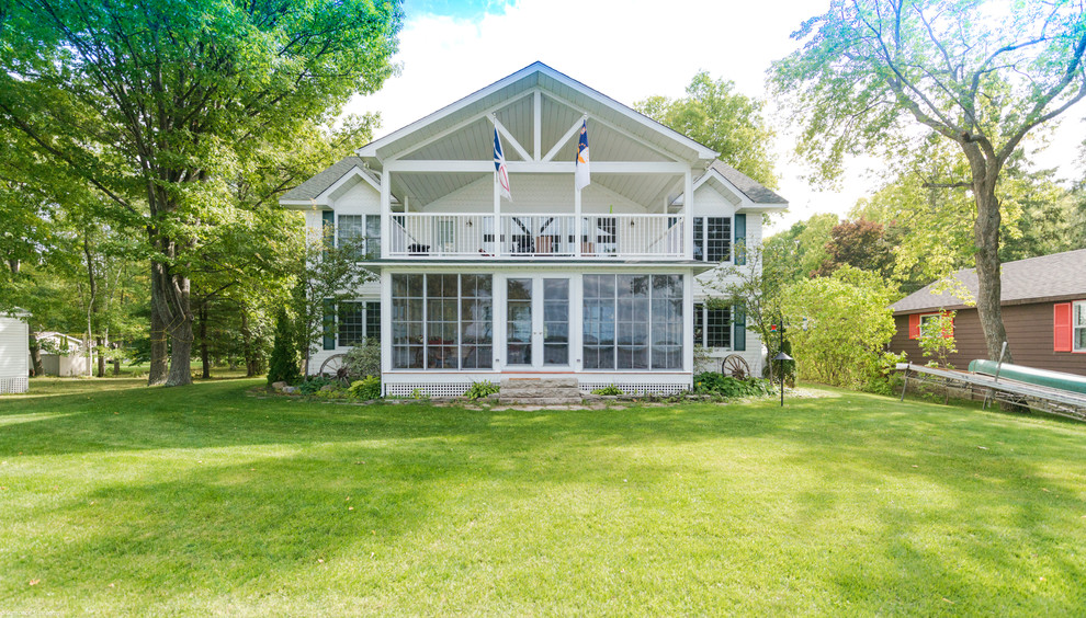 Sunroom - mid-sized transitional medium tone wood floor and brown floor sunroom idea in Other with a standard ceiling