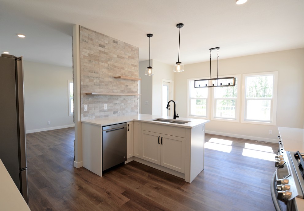 Transitional home design photo in Calgary