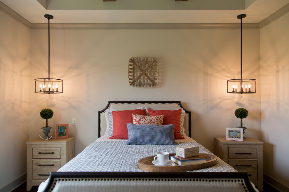 Inspiration for a mid-sized country guest bedroom in Kansas City with beige walls, dark hardwood floors and brown floor.