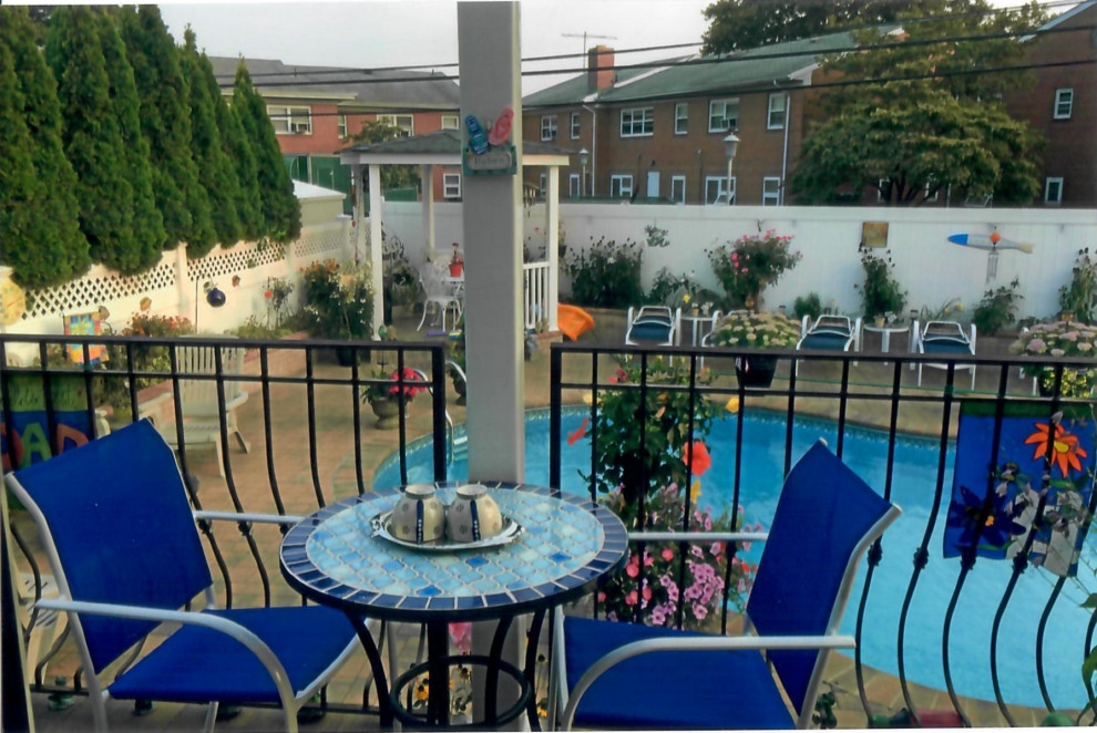 Pool with Whirl pool spill over, outdoor kitchen, outdoor bar, Pergola& Patio