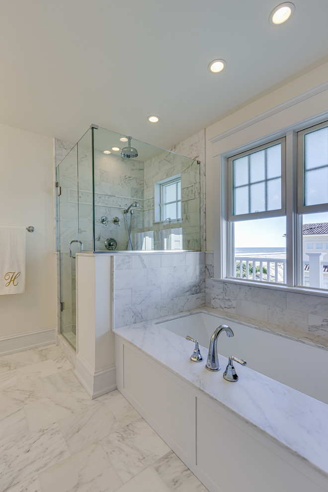 Design ideas for a small beach style master bathroom in Philadelphia with flat-panel cabinets, white cabinets, a one-piece toilet, marble, white walls, marble floors, a drop-in sink, marble benchtops and white floor.