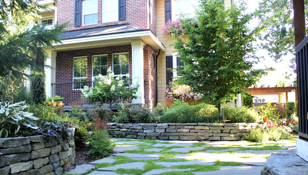 Example of a mountain style home design design in Vancouver