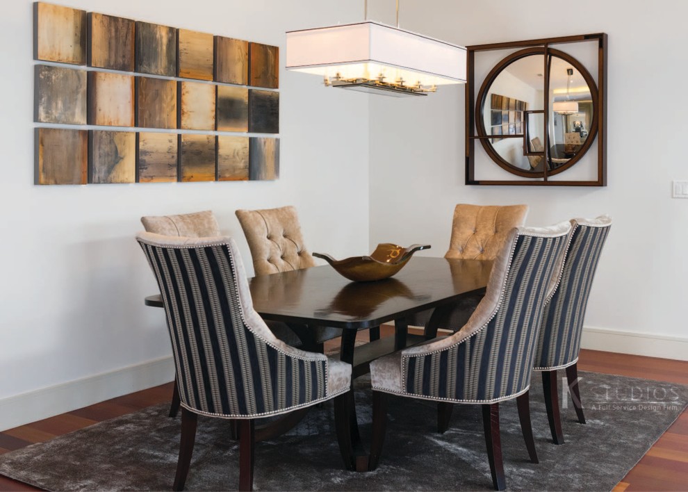 Example of a transitional medium tone wood floor great room design in Denver