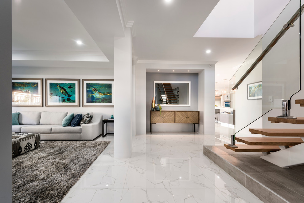 Design ideas for a large contemporary entry hall in Perth with white walls, porcelain floors, a single front door, a white front door and white floor.