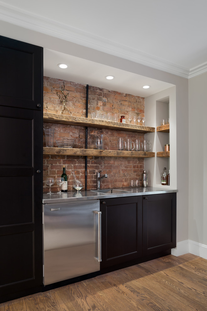 Photo of a country single-wall wet bar in New York with shaker cabinets, dark wood cabinets and dark hardwood floors.