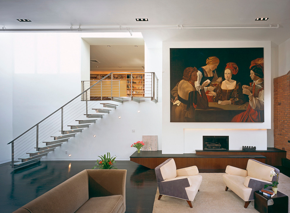 This is an example of a contemporary formal living room in New York with white walls.