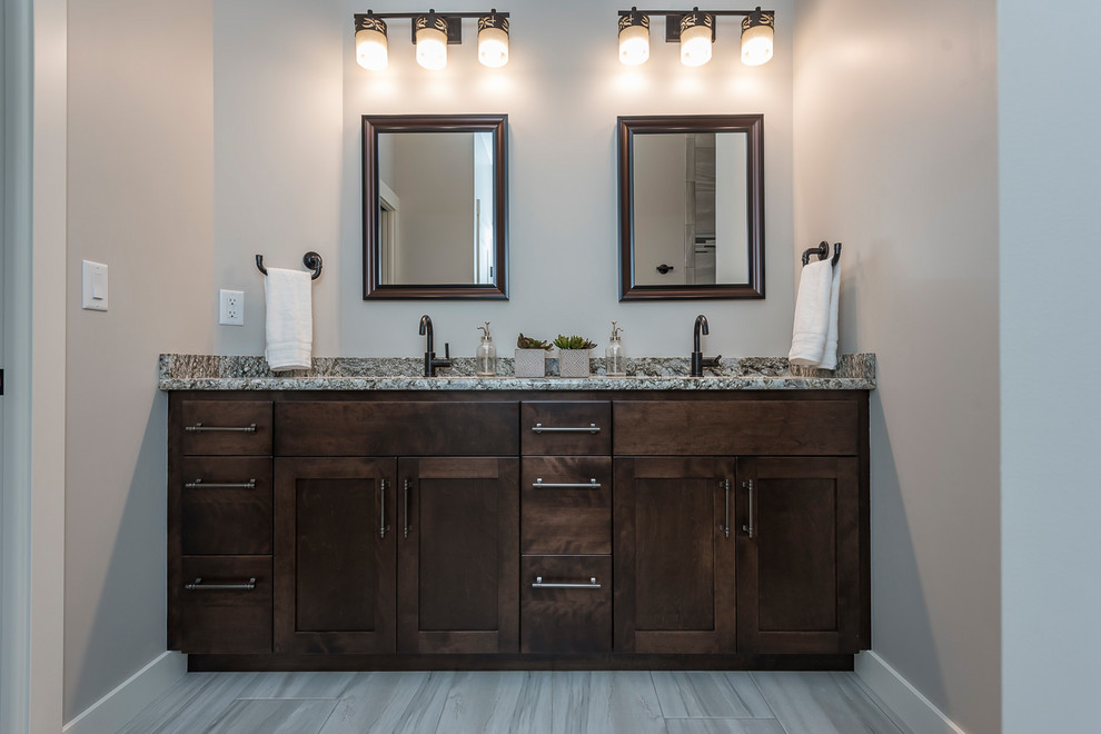 Example of a transitional master bathroom design in Minneapolis