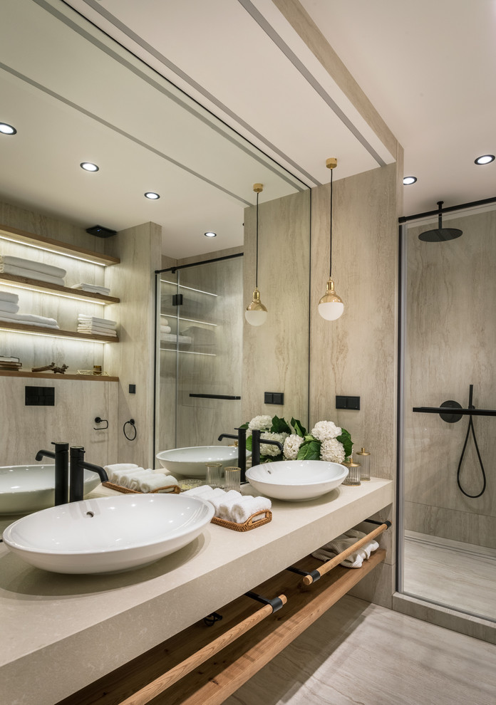 Inspiration for a contemporary 3/4 bathroom in Moscow with open cabinets, an alcove shower, beige tile, a vessel sink, beige floor, a hinged shower door and beige benchtops.