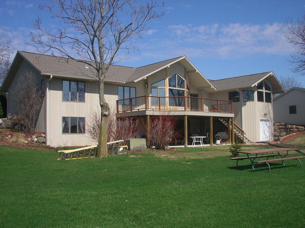Deck - large backyard deck idea with a roof extension