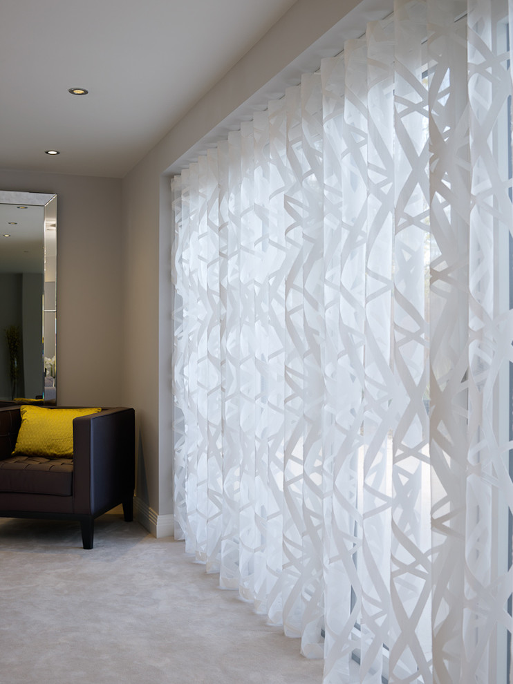 Example of a trendy home design design in Surrey