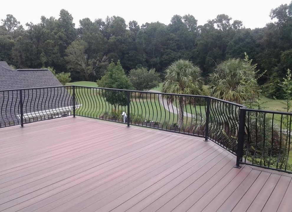 Mid-sized transitional rooftop deck photo in Raleigh with no cover