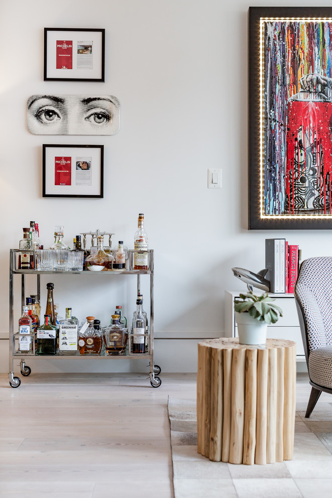 Inspiration for a mid-sized contemporary bar cart in DC Metro with light hardwood floors and beige floor.