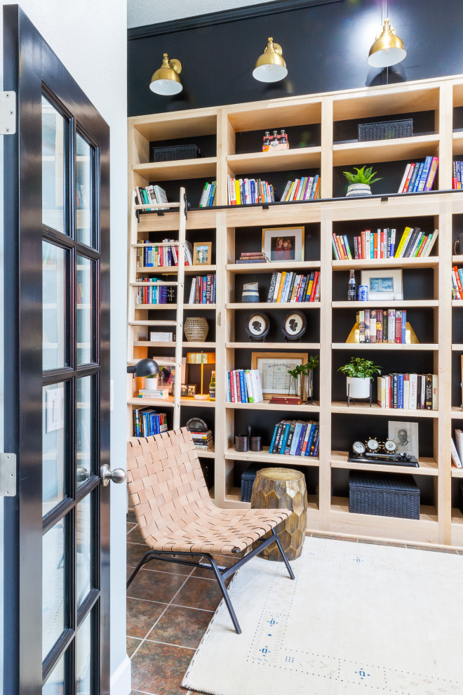 Inspiration for a small transitional home office in Portland with a library, blue walls, slate floors, a freestanding desk and multi-coloured floor.