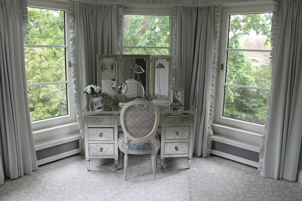 This is an example of a mid-sized traditional master bedroom in New York with grey walls, carpet and grey floor.
