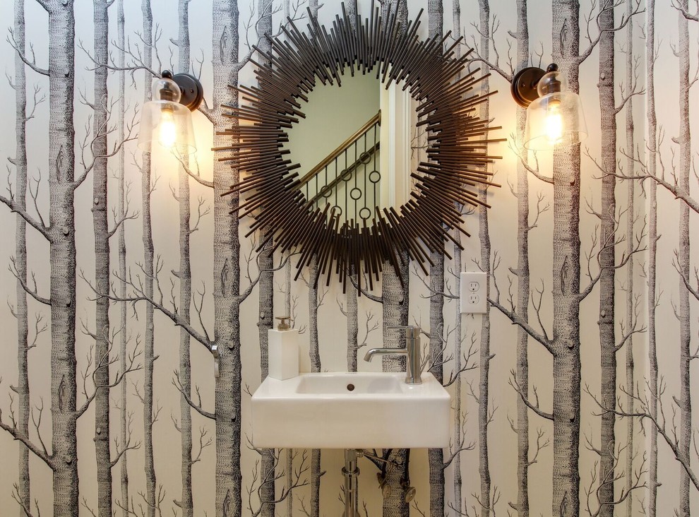 Photo of a small contemporary powder room in Other with brown walls and a wall-mount sink.