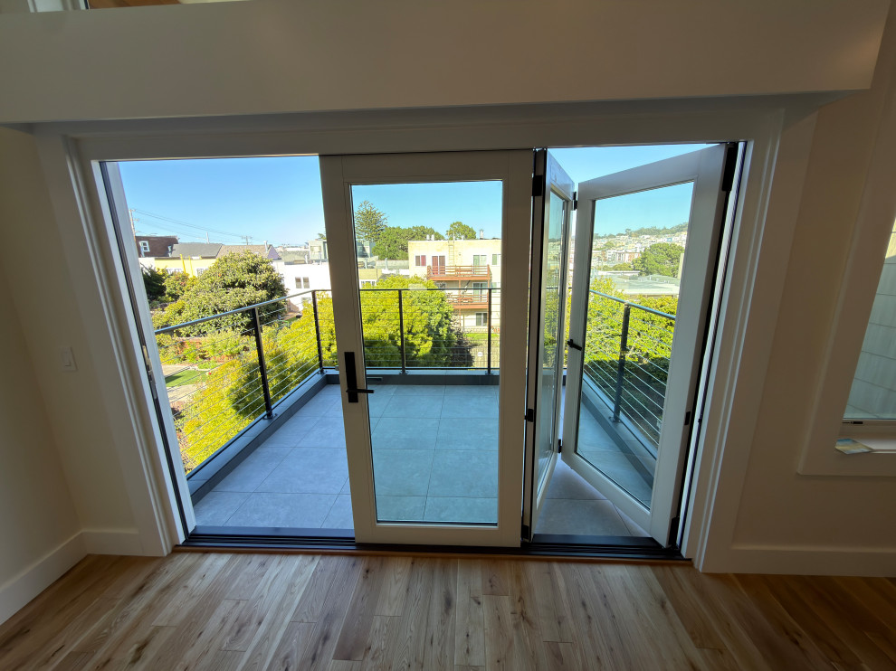 Bedroom Deck Access with Black-Framed Glass Doors