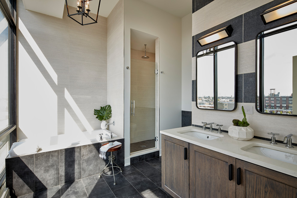 Example of a transitional master gray floor drop-in bathtub design in Chicago with shaker cabinets, distressed cabinets, beige walls, an undermount sink and a hinged shower door