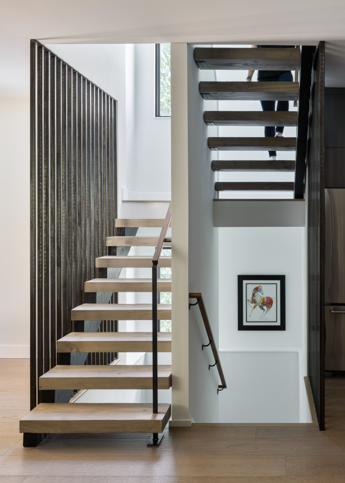 Example of a trendy staircase design in Kansas City