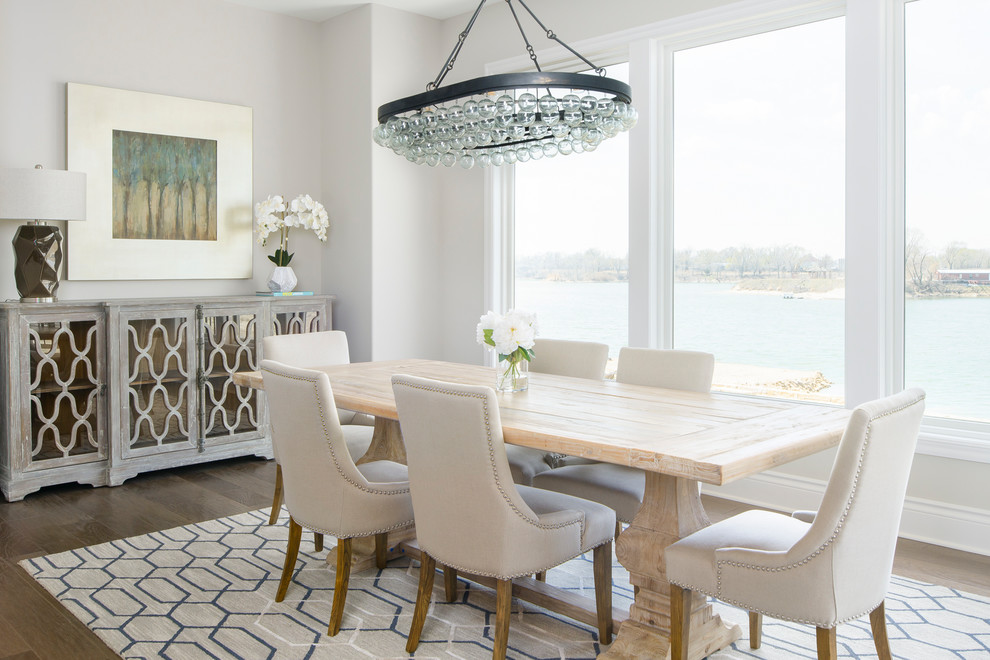 Inspiration for a beach style dining room in Wichita with grey walls, medium hardwood floors and no fireplace.