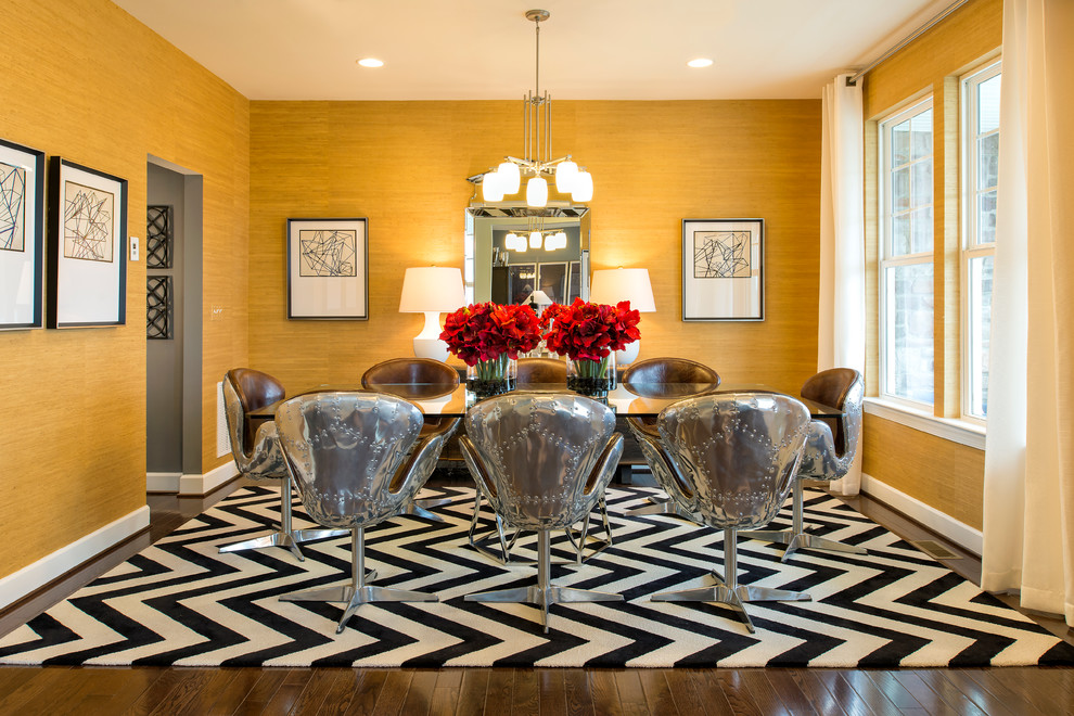 Inspiration for a transitional dining room in DC Metro with yellow walls and dark hardwood floors.