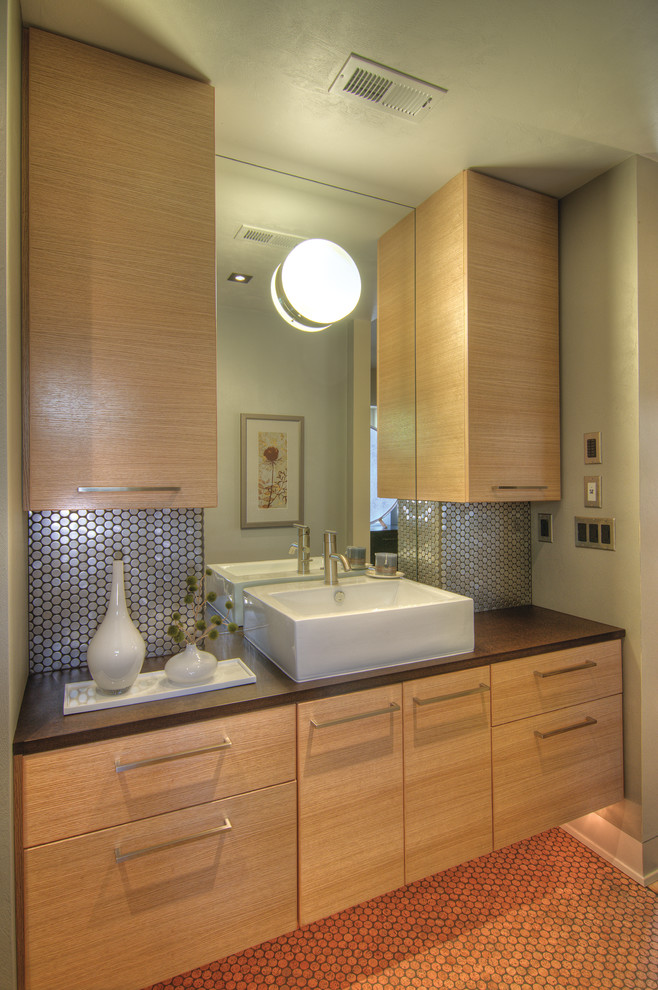 Photo of a small transitional master bathroom in Other with a vessel sink, flat-panel cabinets, light wood cabinets, metal tile, grey walls and cork floors.