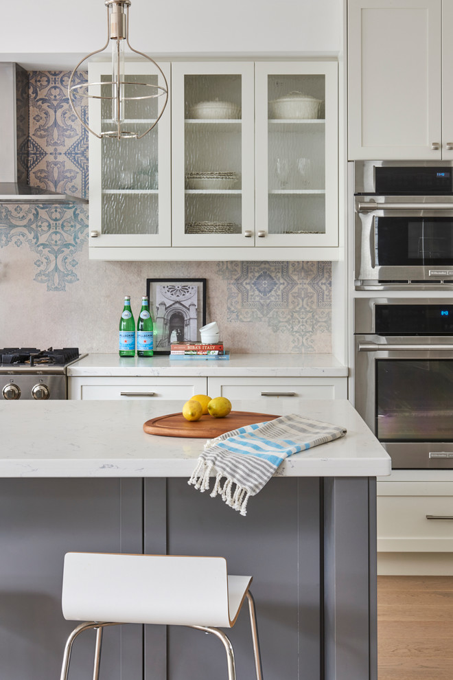 Example of a transitional kitchen design in Toronto