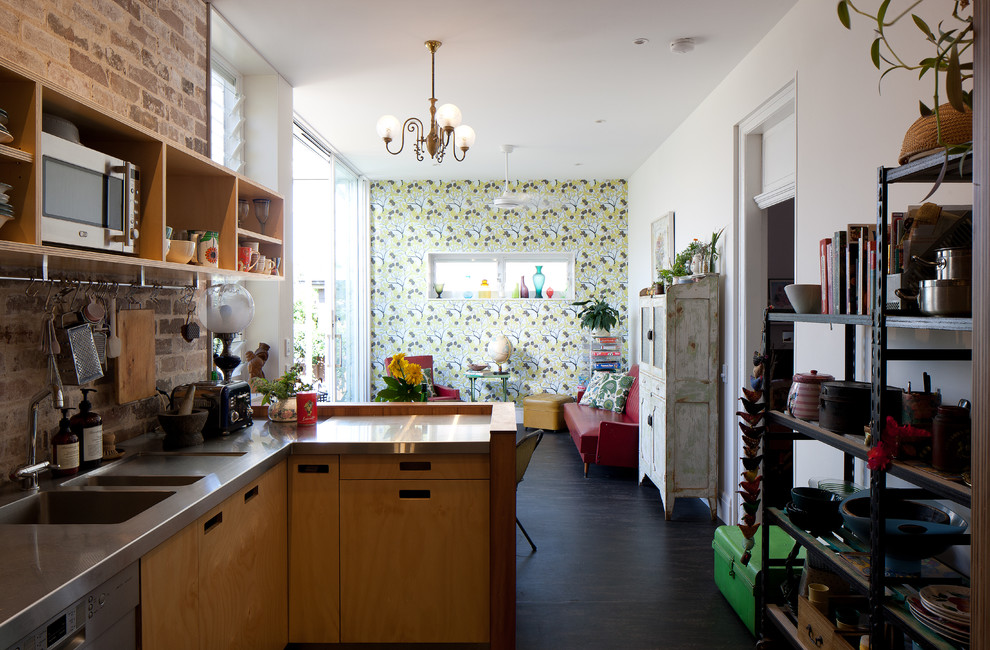 Photo of a small eclectic l-shaped kitchen in Sydney with open cabinets, light wood cabinets, stainless steel benchtops, a double-bowl sink and dark hardwood floors.