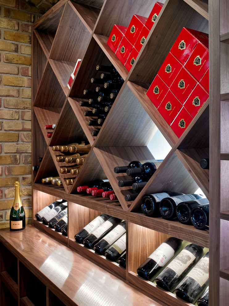 Inspiration for a transitional wine cellar in London.