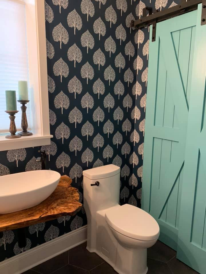 This is an example of a transitional powder room in Philadelphia.
