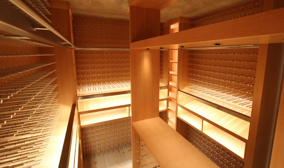 Photo of a contemporary wine cellar in Seattle.