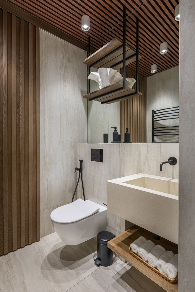 Contemporary powder room in Moscow with travertine floors and beige floor.