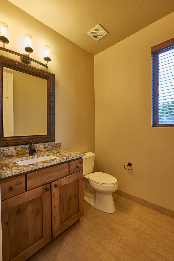 Photo of a transitional powder room in Denver.