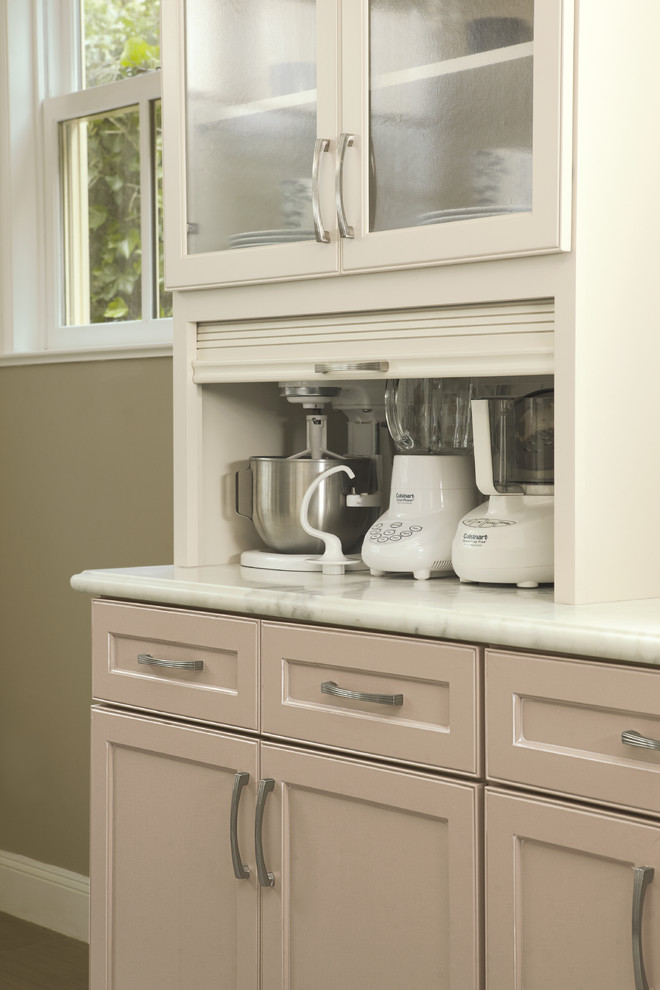 Transitional kitchen photo in Toronto with shaker cabinets, beige cabinets and marble countertops
